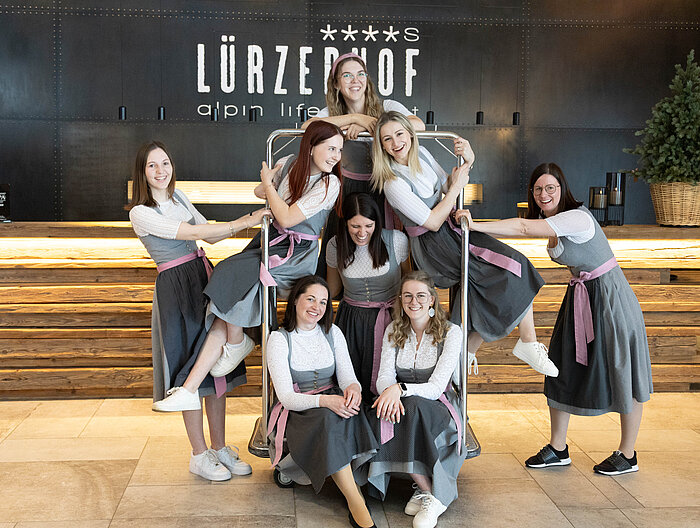 Receptionists dressed in dirndls in the lobby of the Hotel Lürzerhof