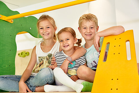 Children play in the play area of the Lürzerhof, the family hotel in Austria for vacations with children.
