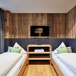 Das Kinderzimmer in der Alpin Life de Luxe Lodge im Wellnesshotel Lürzerhof in Salzburg