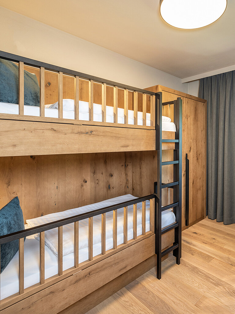 The children's room in the Mountain Family Plus family suite at the Lürzerhof